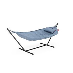 a blue hammock sitting on top of a metal stand