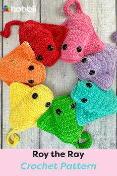 the crochet pattern is shown in four different colors and features an adorable cat's head