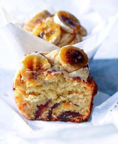 two pieces of cake sitting on top of white paper