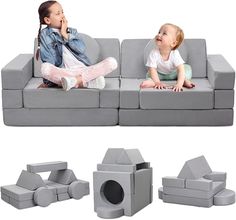 two children sitting on a gray couch with different shapes and sizes to make it look like they are playing