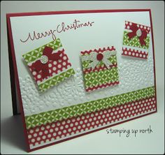 a christmas card with red, green and white paper