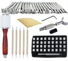 an assortment of kitchen tools and utensils on a white background