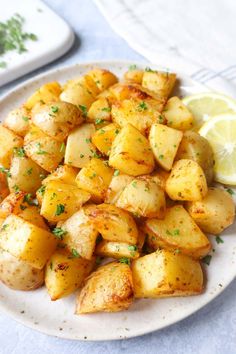 white plate with chopped crispy air fried greek potatoes topped with fresh parsley Greek Potatoes Recipe, Greek Lemon Potatoes, Healthy Air Fryer, The Best Air Fryer, Greek Potatoes, Seasoned Potatoes, Best Air Fryer, Lemon Potatoes, Yellow Potatoes