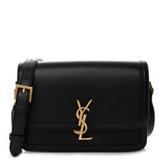 This is an authentic SAINT LAURENT Box Calfskin Monogram Medium Solferino Satchel in Black. This chic shoulder bag is crafted of smooth leather. The bag features an adjustable shoulder strap with aged gold hardware. The crossover flap opens with a matching gold YSL monogram press lock to a black leather interior with patch pockets. Quilted Toys, Gold Sand, College Bags, Saint Laurent Bag, Wallet Chain, Chain Bags, Leather Interior, Smooth Leather, Gold Hardware