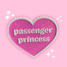 a pink heart with the words passenger princess on it