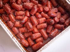 a pan filled with food sitting on top of a counter