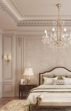 a bedroom with a bed, chandelier and two lamps on either side of the bed