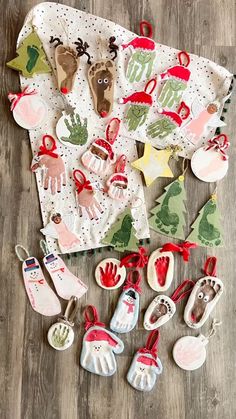 various christmas ornaments are laid out on the floor next to each other, including mittens and gloves