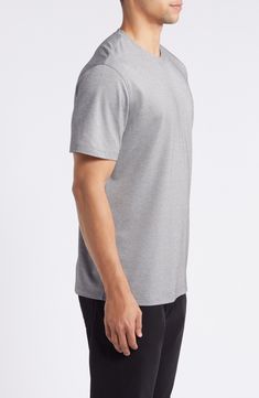 Classic, comfortable and easy to wear, this staple T-shirt looks great on its own and makes an ideal layer when the weather cools. Crewneck Short sleeves 51% polyester, 22% cotton, 21% modal, 6% spandex Machine wash, tumble dry Imported Modern Gray Cotton Tops, Solid Color Cotton T-shirt For Athleisure, Modern Gray Cotton Top, Casual Cotton T-shirt With Moisture-wicking, Urban Crew Neck Top For Everyday, Classic Heather Grey Cotton Top, Casual Cotton Tops With Moisture-wicking, Modern Crew Neck T-shirt For Everyday, Modern Gray Crew Neck Tops