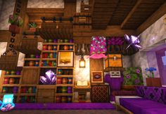 a living room filled with lots of furniture and bookshelves covered in purple blankets