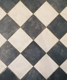 a black and white checkered tile floor