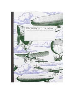 a green and white book with an image of airplanes on the cover, which reads decomposition book