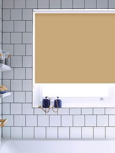 a bath room with a tub a window and some shelves on the wall in front of it