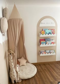 a child's room with a bed, bookshelf and stuffed animals