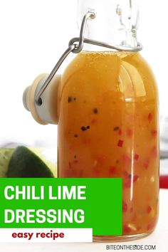 a glass jar filled with chili lime dressing