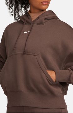 Supersoft fleece means all-day comfort in a dropped-shoulder hoodie perfect for relaxing at home or heading to the gym. 24" length (size Medium) Drawstring hood 80% cotton, 20% polyester Machine wash, tumble dry Imported Brown Nike Hoodie, Sweaters Nike, Nike Sportswear Phoenix Fleece, Nike Cropped Hoodie, Nike Quarter Zip, 2024 Wishlist, Nike Brown, Brown Hoodie, Hoodie Aesthetic