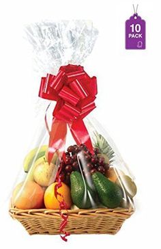 a basket filled with lots of fruit and wrapped in cellophane to look like a gift