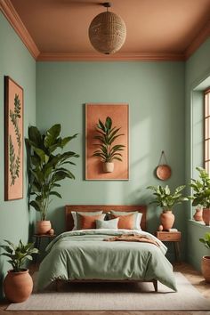 a bedroom with green walls and potted plants