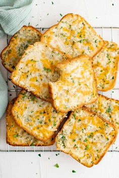 cheesy garlic bread on a cooling rack