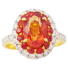 Orange Sapphire 2.04 carats with Orange Sapphire 0.38 carat and Diamond 0.48 carat Ring set in 18K Gold Settings Width: 1.1 cm Length: 1.3 cm Ring Size: 51 Total Weight: 4.13 grams "We first opened doors in 1980 when it was then situated in the vicinity of the Victory Monument; a small and modest storefront with a couple of counters. From its humble beginnings to where it stands today, our company has proven its abilities as a jeweler. Since the beginning, we have been supplying fine quality pieces to dealers, wholesalers and customers worldwide. From then till now, our business still interrelates its name with quality products and excellent service, where commitment and sincerity toward customers will always be its motto." Luxury Orange Diamond Wedding Ring, Luxury Orange Sapphire Engagement Ring, Brown Diamond Ring, Orange Jewelry, Orange Sapphire, Diamond Ring Settings, Sapphire Diamond Ring, Modern Ring, Brown Diamond