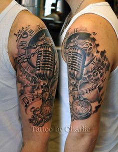 two men with tattoos on their arms, one has a microphone and the other has music notes