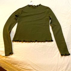 Super Cute Moss Green Light Weight Top Cute Ruffle Edges Around Neck Hem And Sleeves Very Stretchy Fabric Never Worn Excellent Condition Heart Top, Mock Turtleneck, Green Tops, Light Green, Super Cute, Turtle Neck, Womens Tops, Green, Women Shopping