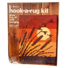 the hook - a - rug kit has been designed to look like it is on display