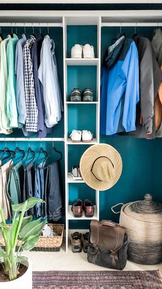 an organized closet with shoes, hats and clothing hanging on the wall next to a rug