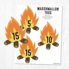 three fire stickers with the number fifteen and five burning logs on top of them