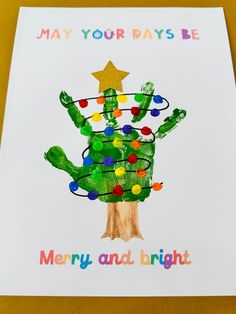 a handprinted christmas card with a tree on it that says, may your days be merry and bright