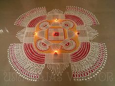 an intricate design on the ground with lights