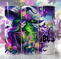 three colorful coffee mugs with designs on them, one in the shape of a witch