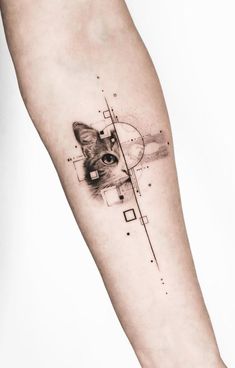 a cat's face is shown on the arm with geometric shapes and lines around it