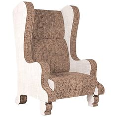 a brown and white chair sitting on top of a wooden floor