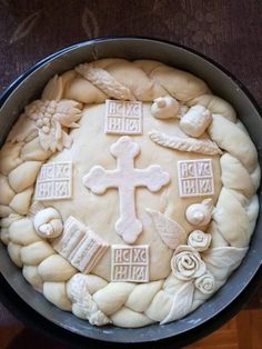 a cake decorated with white icing in a pan