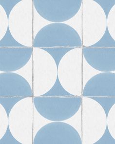 a blue and white tile pattern with circles