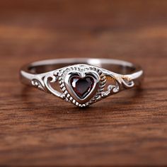 Solid 925 Sterling Silver 4mm January Birthstone Dark Red Garnet Color Heart CZ Bezel Set Rope Filigree Baby Girls Childrens Teens Ring ▷Gift Box Included ▷7mm Height ▷Size 1 - 12 Available ▷925 Sterling Silver (not plated or filled) ▷925 Stamp Authenticity ▷High-Quality Cubic Zirconia Used https://www.etsy.com/shop/TrendyRing Dark Red Ring, Grandma Jewelry, Teen Ring, Garnet Color, Edgy Jewelry, Color Heart, Garnet Jewelry, January Birthstone