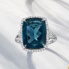 Ross-Simons - 12.00ct London Blue Topaz, .40ct t. w. Diamond Ring Emerald Cut in 14kt White Gold. Size 6. A radiant look for a brand-new you. This magnificent 12.00 carat rectangular cushion-cut London blue topaz exudes a deep velvety hue that is simply beyond compare. Edged in .40 ct. t. w. round brilliant-cut diamonds and set in polished 14kt white gold. 3/4" wide. Diamond and London blue topaz ring. Blue Topaz birthstones are the perfect gift for December birthdays. Diamond Ring Emerald Cut, Diamond Ring Emerald, Topaz Birthstone, Rectangular Cushion, Emerald Cut Diamond Ring, December Birthday, London Blue Topaz Ring, Ring Emerald, Ring Blue