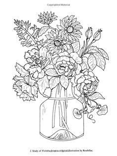 a vase filled with lots of flowers on top of a white tablecloth and surrounded by leaves