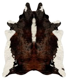 a brown and white cowhide rug on a white background with an animal's fur pattern