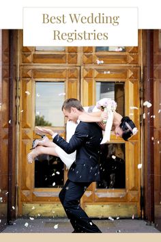 a man and woman are dancing in front of a door with confetti falling from it