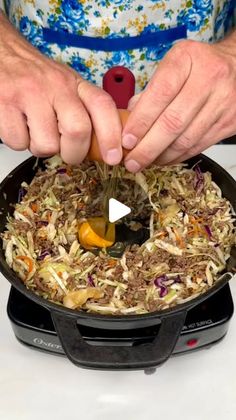 a person is cooking food in a skillet