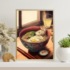 a bowl of ramen with an egg in it on a table next to a plant