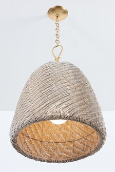 the light fixture is made from woven material and has a gold chain hanging from it