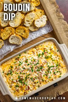 a casserole dish with bread and chives on the side