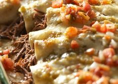 a close up of food on a plate with meat and vegetables in the sauces