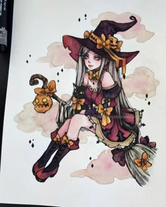 a drawing of a woman wearing a witch costume and holding a cat on her lap