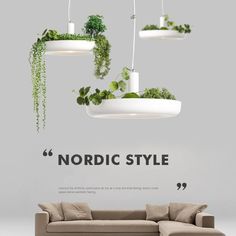 an advertisement for nordic style with plants hanging from the ceiling and sofa in front of it