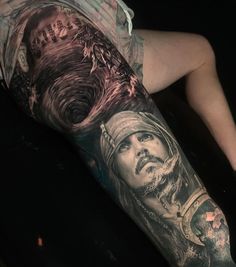 a man with a tattoo on his arm