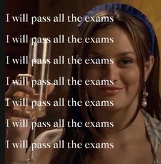 a woman holding a wine glass in her hand with the words i will pass all the exam